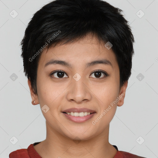 Joyful asian young-adult female with short  black hair and brown eyes