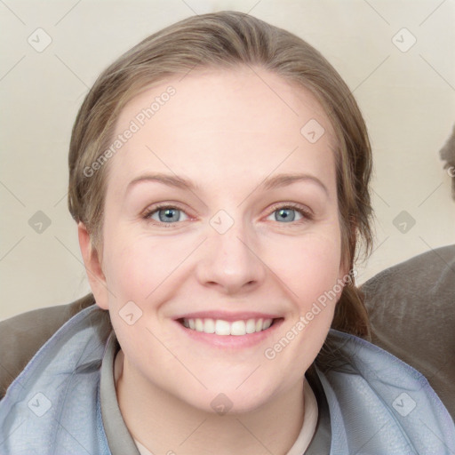 Joyful white young-adult female with medium  brown hair and blue eyes