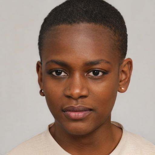 Neutral black young-adult female with short  brown hair and brown eyes