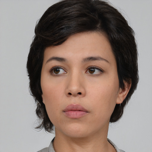 Neutral white young-adult female with medium  black hair and brown eyes