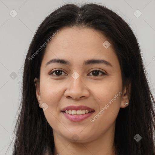 Joyful latino young-adult female with long  brown hair and brown eyes