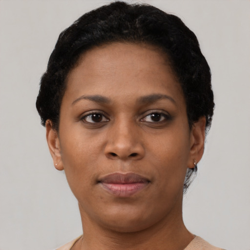 Neutral black young-adult female with short  brown hair and brown eyes
