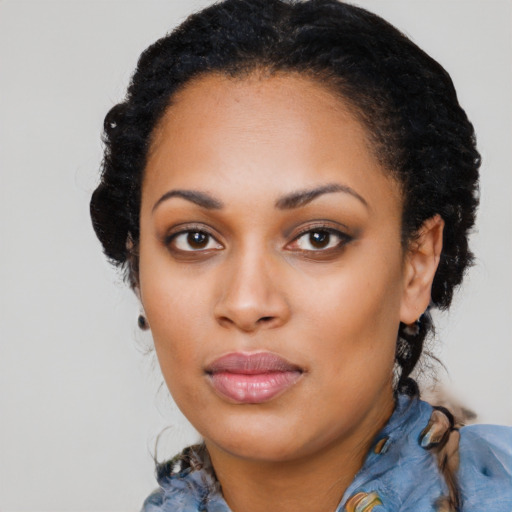 Neutral black young-adult female with medium  black hair and brown eyes