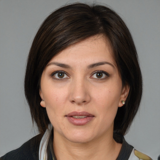 Neutral white young-adult female with medium  brown hair and brown eyes