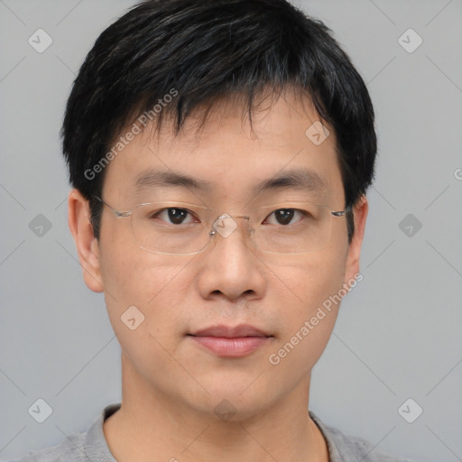 Neutral asian young-adult male with short  black hair and brown eyes