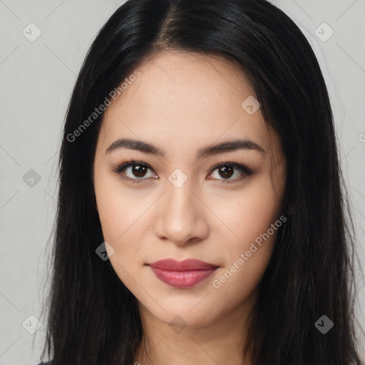 Joyful latino young-adult female with long  black hair and brown eyes