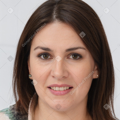 Joyful white young-adult female with long  brown hair and brown eyes