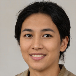 Joyful asian young-adult female with medium  brown hair and brown eyes