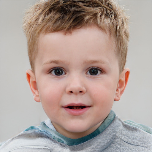 Joyful white child male with short  brown hair and blue eyes