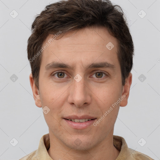 Joyful white adult male with short  brown hair and brown eyes