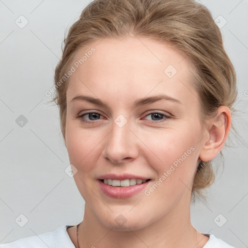 Joyful white young-adult female with medium  brown hair and blue eyes