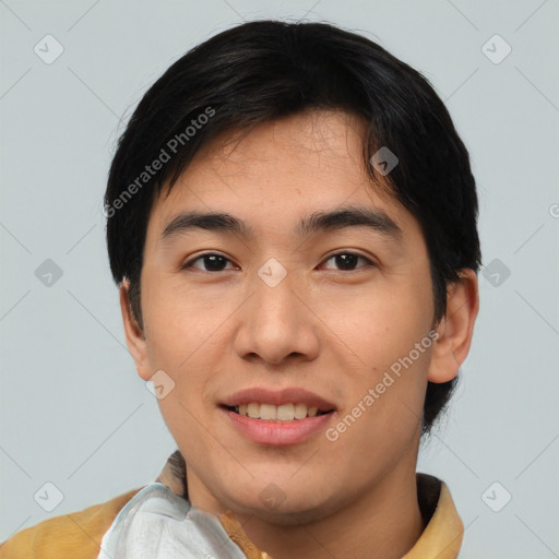 Joyful asian young-adult male with short  black hair and brown eyes