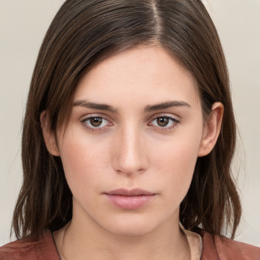 Neutral white young-adult female with medium  brown hair and brown eyes