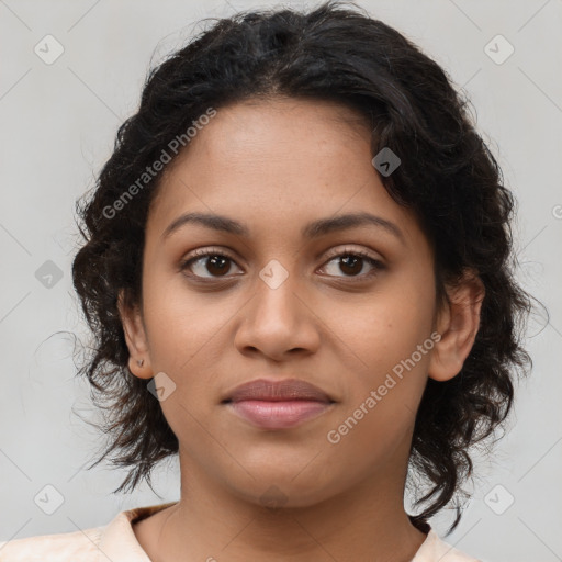 Joyful latino young-adult female with medium  brown hair and brown eyes