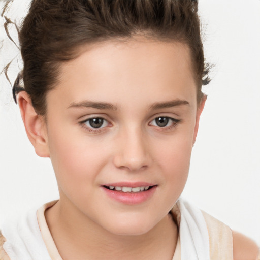 Joyful white child female with short  brown hair and brown eyes