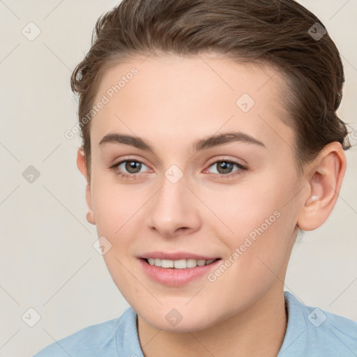 Joyful white young-adult female with short  brown hair and brown eyes