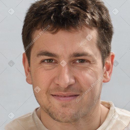 Joyful white adult male with short  brown hair and brown eyes