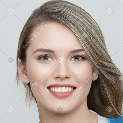 Joyful white young-adult female with medium  brown hair and blue eyes