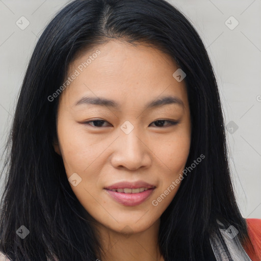 Joyful asian young-adult female with long  brown hair and brown eyes