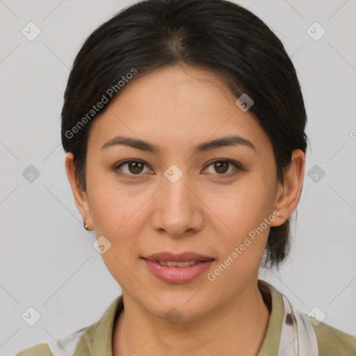 Joyful latino young-adult female with medium  brown hair and brown eyes