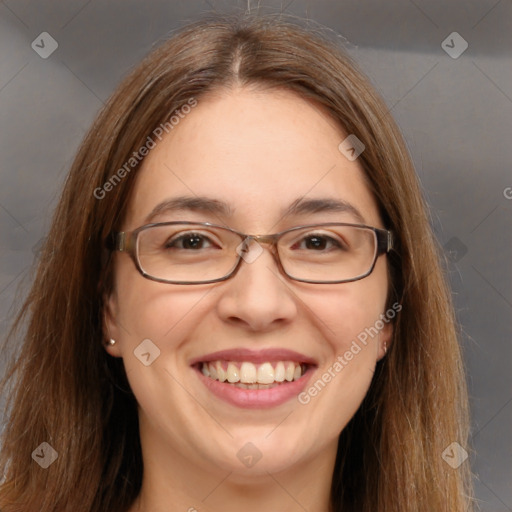 Joyful white adult female with long  brown hair and brown eyes