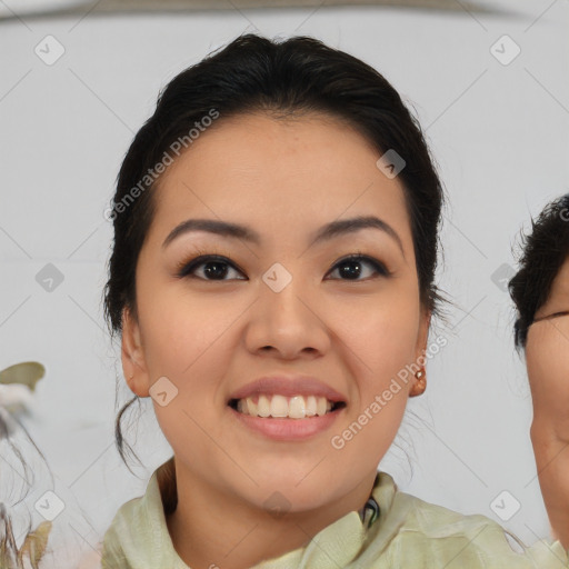 Joyful asian young-adult female with medium  brown hair and brown eyes