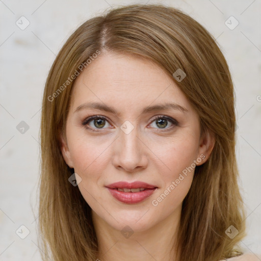 Joyful white young-adult female with long  brown hair and green eyes