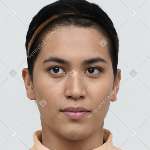 Joyful latino young-adult female with short  brown hair and brown eyes