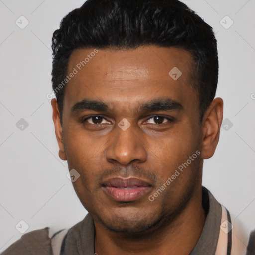 Neutral latino young-adult male with short  black hair and brown eyes