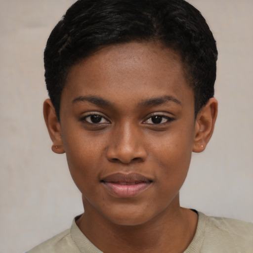 Joyful black young-adult female with short  brown hair and brown eyes