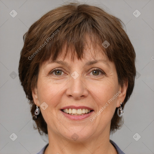 Joyful white adult female with medium  brown hair and grey eyes