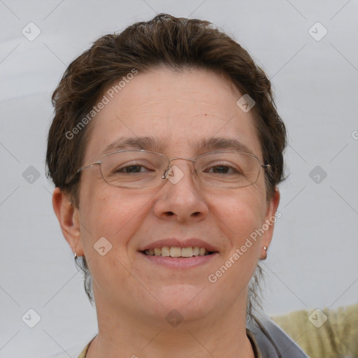 Joyful white adult female with short  brown hair and brown eyes