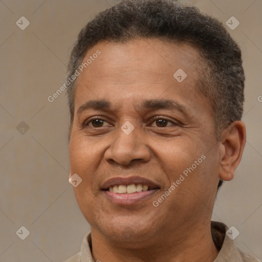 Joyful latino adult male with short  brown hair and brown eyes