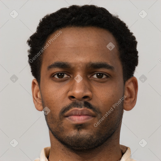 Neutral black young-adult male with short  brown hair and brown eyes