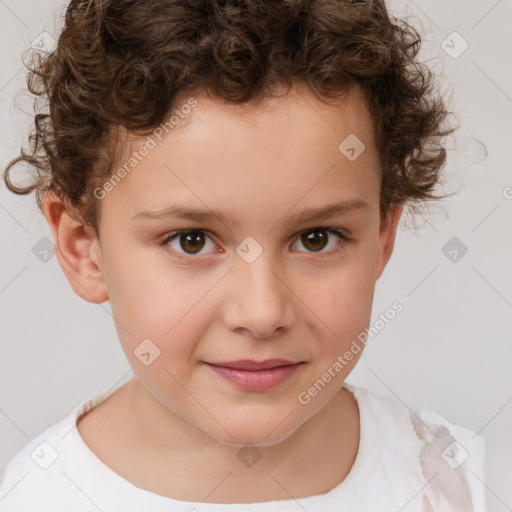 Joyful white child male with short  brown hair and brown eyes