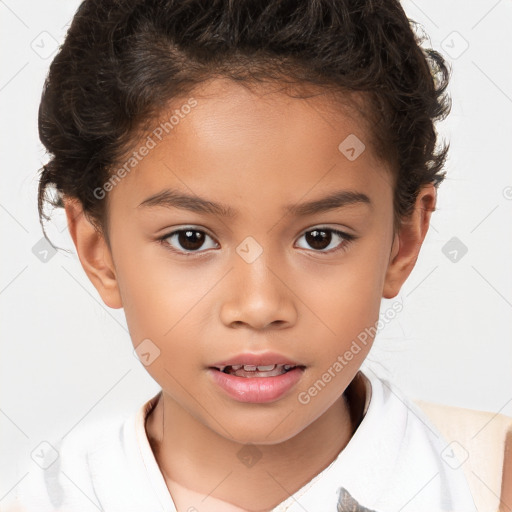 Joyful white child female with short  brown hair and brown eyes