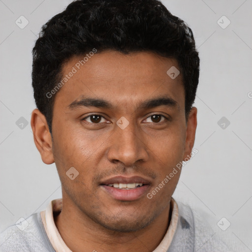 Joyful latino young-adult male with short  brown hair and brown eyes