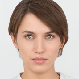 Neutral white young-adult female with short  brown hair and brown eyes