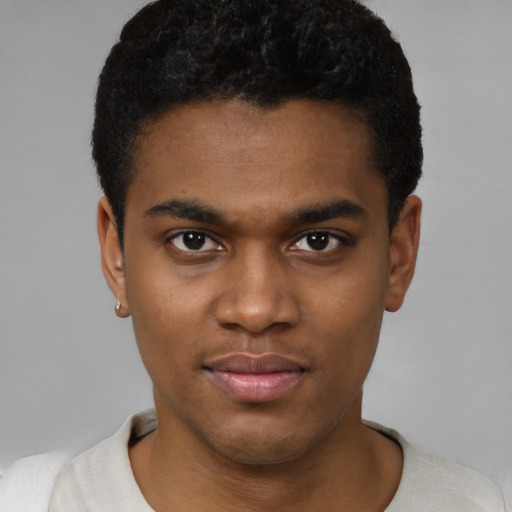 Neutral black young-adult male with short  brown hair and brown eyes