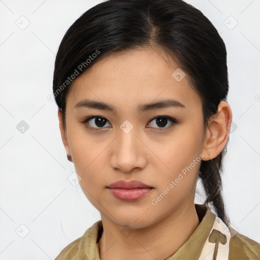 Joyful asian young-adult female with medium  brown hair and brown eyes