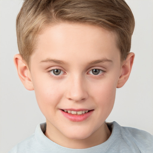 Joyful white child female with short  brown hair and grey eyes