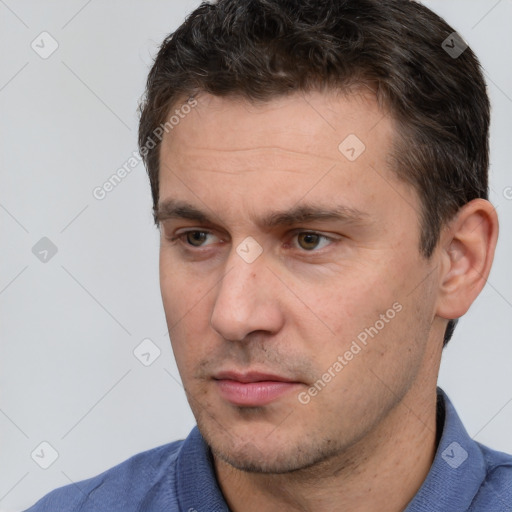 Neutral white adult male with short  brown hair and brown eyes