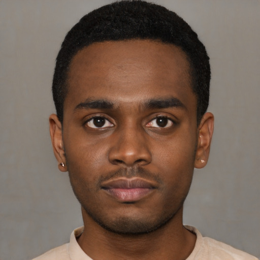Neutral black young-adult male with short  black hair and brown eyes