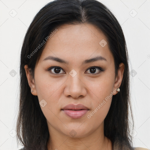 Joyful asian young-adult female with long  brown hair and brown eyes