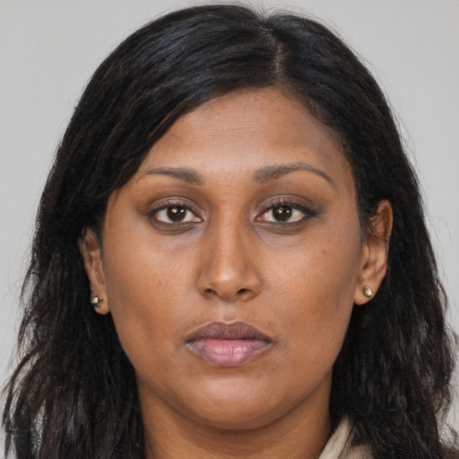 Neutral asian young-adult female with long  brown hair and brown eyes