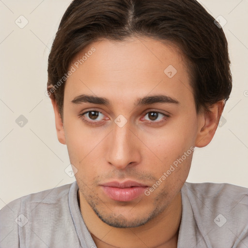 Neutral white young-adult male with short  brown hair and brown eyes