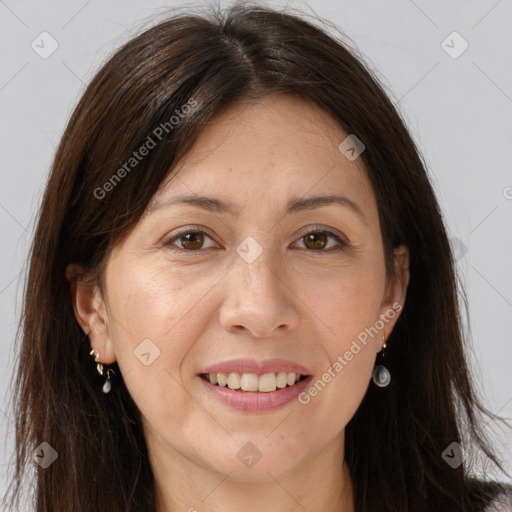 Joyful white adult female with long  brown hair and brown eyes