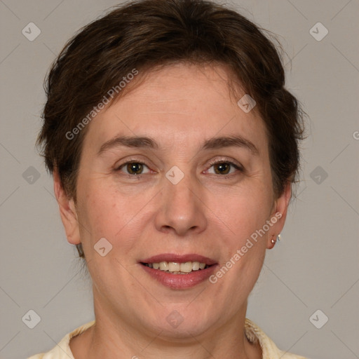 Joyful white adult female with short  brown hair and brown eyes