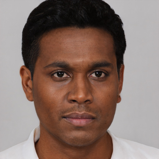 Neutral black young-adult male with short  black hair and brown eyes