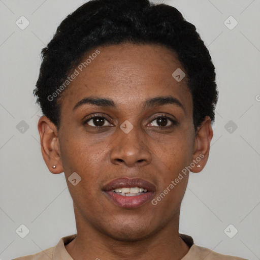 Joyful black young-adult female with short  black hair and brown eyes